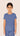 Young girl wearing a blue outfit on a beige background | One of a Kin
